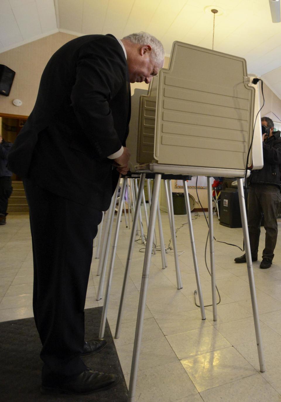 Illinois Gov. Pat Quinn votes at Galewood Community Church In Chicago, Tuesday, March 18, 2014. (AP Photo/Paul Beaty)