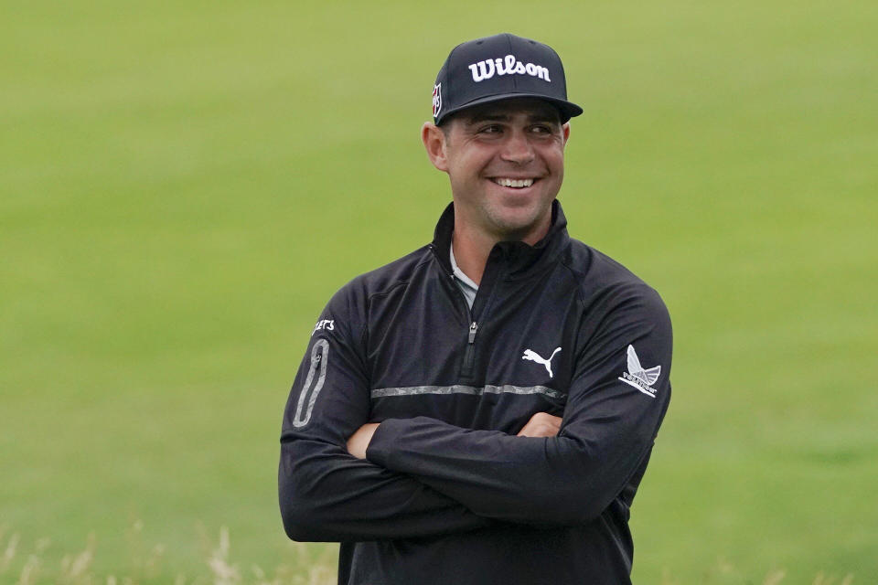 Gary Woodland smiles after finishing the second round in the U.S. Open golf tournament Friday, June 14, 2019, in Pebble Beach, Calif. (AP Photo/Carolyn Kaster)
