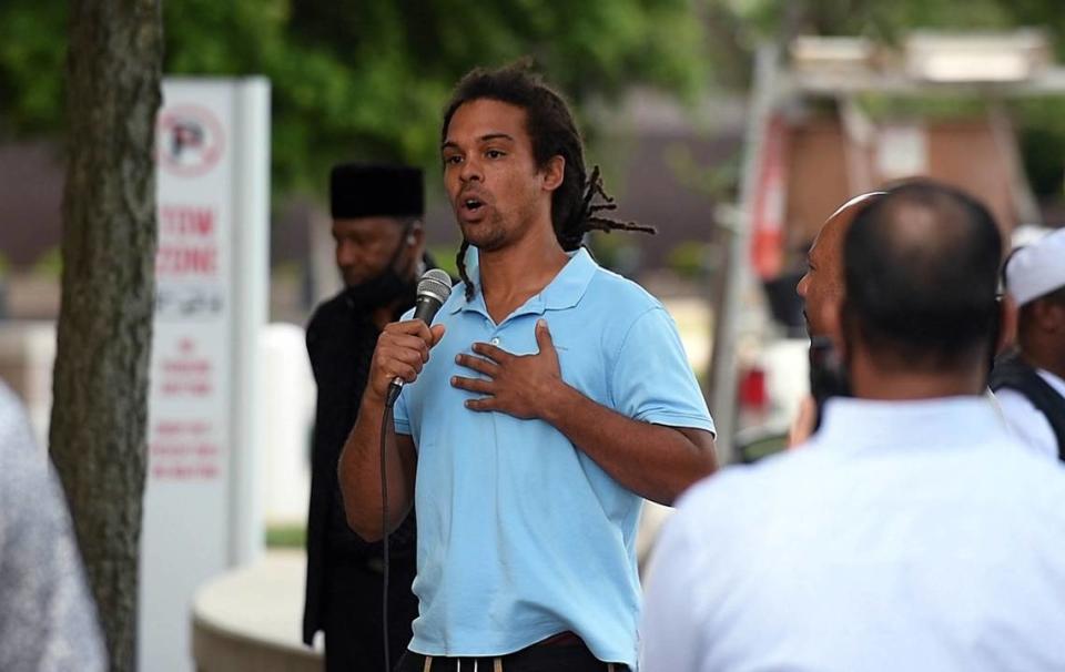 Charlotte City Councilman Braxton Winston speaks tp a gathering of Islamic worshippers in the courtyard outside the Charlotte-Mecklenburg Government Center on Friday, June 12, 2020. The Islamic Center of Charlotte hosted a Friday Prayer (Jumuah) with a sermon entitled Justice On Demand. The Friday congregational prayer is held each Friday usually at area Islamic Centers of Masjids. With George Floyd and police brutality on the minds of most, the sermon spoke to that and the systemic racism in America that continues to allow for so many injustices to occur. America is at a crossroads and now is the time for all people of good faith to speak up and work towards real change.