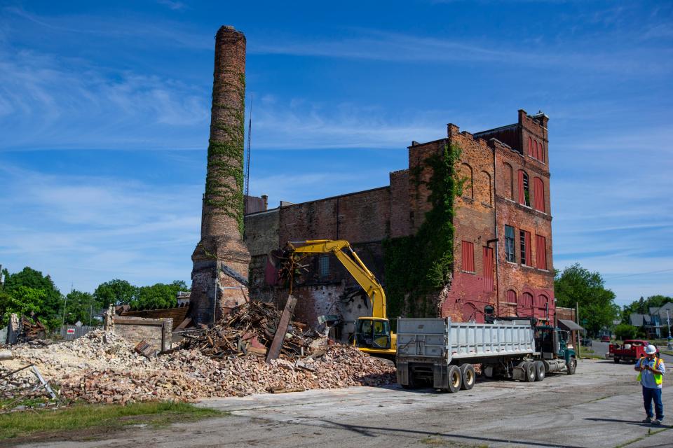 Demolition underway Friday, June 10, 2022 at the Former South Bend Brewing Association building in South Bend. 