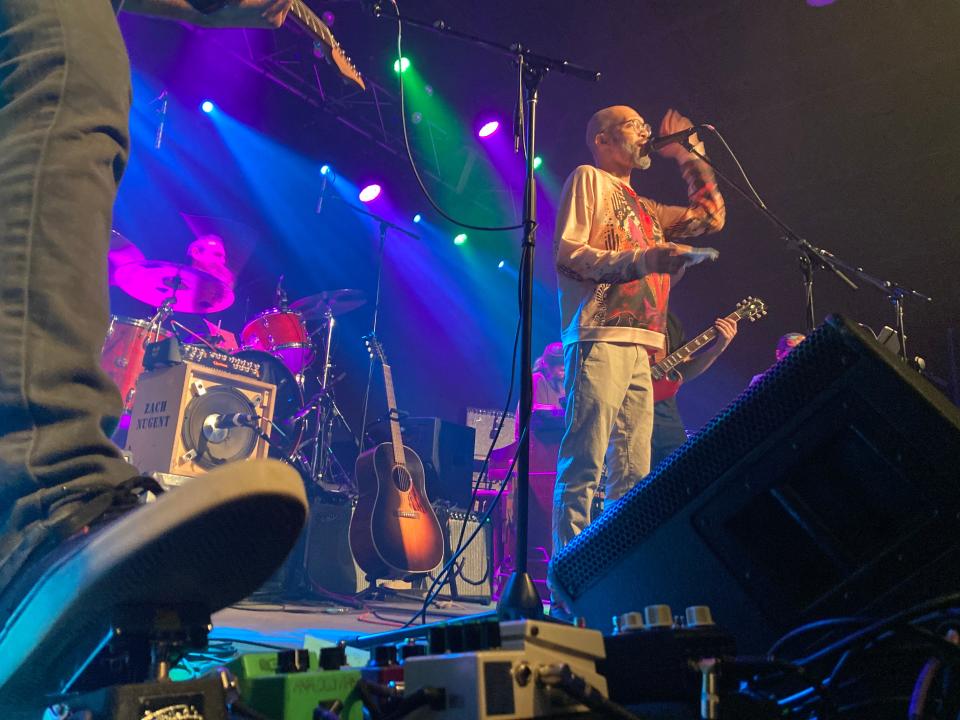 Guitarist Rob Compa works the wah-wah pedal while Craig Mitchell sings the Curtis Mayfield song "Freddie's Dead" March 16, 2022 at the "'72 Review" concert at Higher Ground in South Burlington.