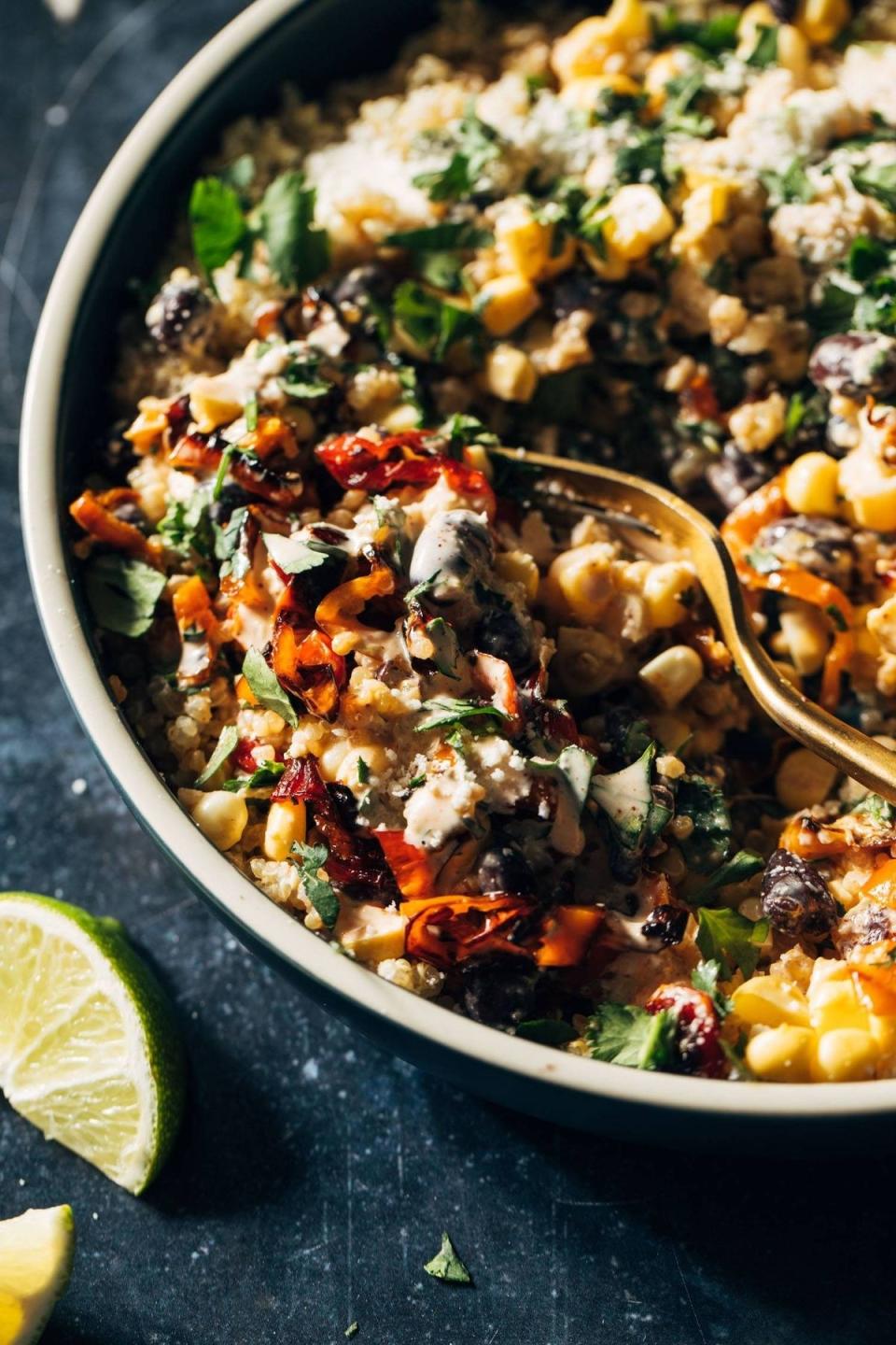 An elote-style quinoa salad with corn, peppers, and cheese.