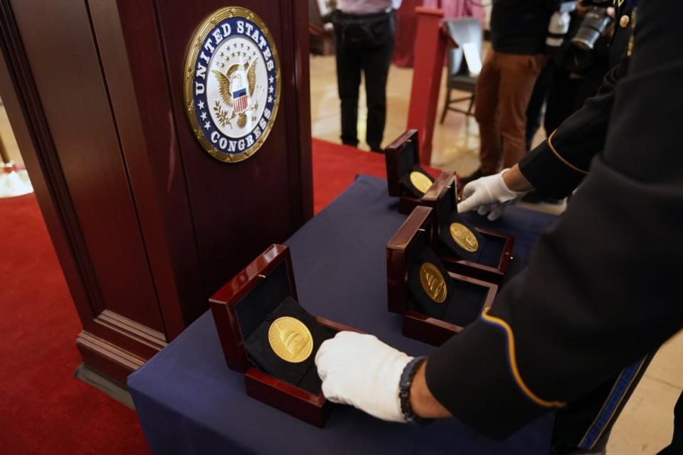 Congressional Gold Medals are placed before a ceremony honoring law enforcement officers who defended the U.S. Capitol on Jan. 6, 2021. (AP Photo/Alex Brandon)