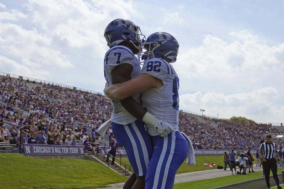 Duke running back Jordan Waters (7) celebrates his touchdown with tight end Cole Finney (82) against Northwestern during the first half of an NCAA college football game, Saturday, Sept.10, 2022, in Evanston, Ill. (AP Photo/David Banks)