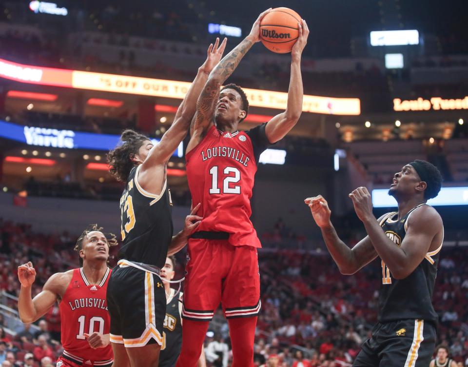 Louisville forward JJ Traynor (12) won't play again this season after he reinjured a shoulder, but coach Kenny Payne said he didn't know if Traynor will pursue a medical redshirt.
