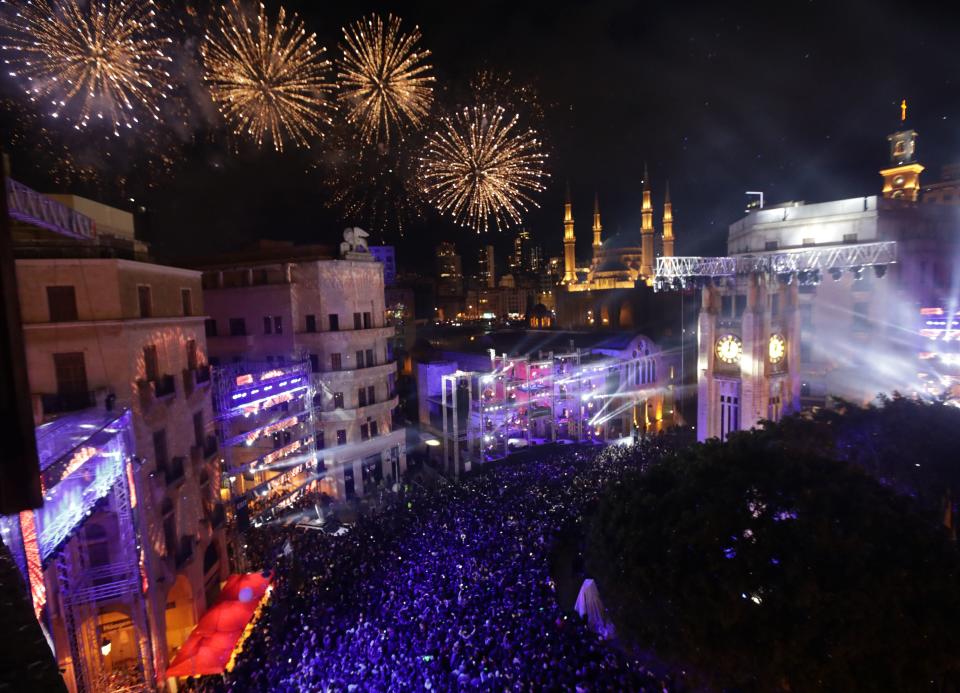 Fireworks explode over downtown Beirut, Lebanon during New Year's celebrations on January 1, 2018. (Photo: ANWAR AMRO via Getty Images)