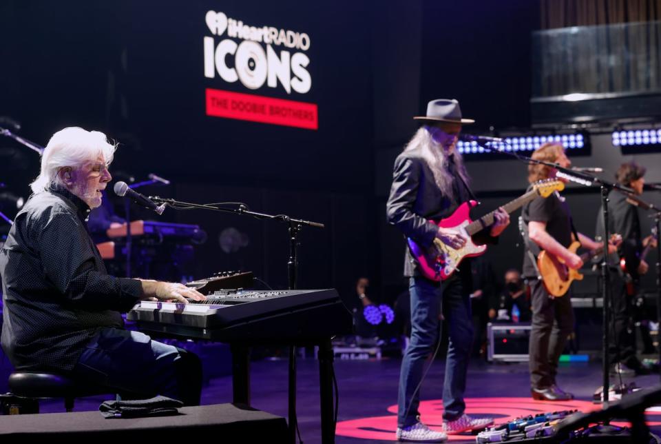 From left: Michael McDonald, Patrick Simmons, Tom Johnston, and John McFee of The Doobie Brothers perform in Burbank, Calif., on Oct. 1, 2021.