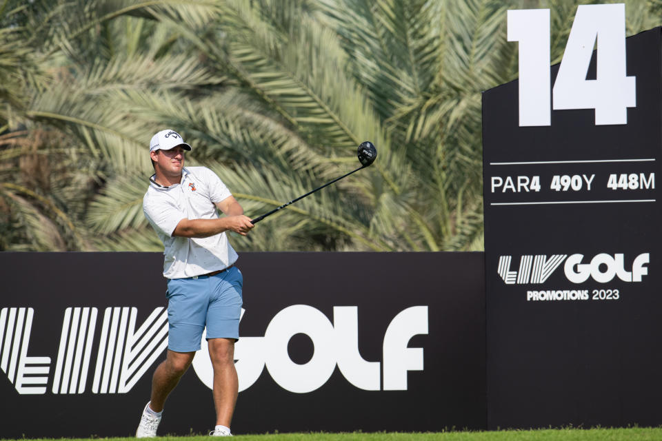 Zach Bauchou of the USA hits his shot from the 14th tee during the first round of the LIV Golf Promotions at the Abu Dhabi Golf Club on Friday, December 08, 2023 in Abu Dhabi, United Arab Emirates. (Photo by Montana Pritchard/LIV Golf)