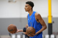 Boulogne-Levallois Metropolitans 92's Victor Wembanyama stands on the court during a team practice, Monday, Oct. 3, 2022, in Las Vegas. (AP Photo/Abbie Parr)