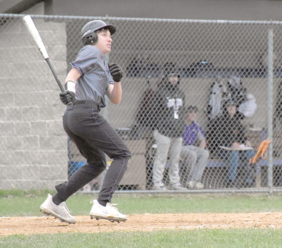 Little Falls Mountie Jack Morotti follows through on the sing that produced a triple against West Canada Valley Monday. Morotti's one-out hit was followed by a balk and he scored the tying run in the top of the seventh inning of an eventual 13-12 Little Falls victory.