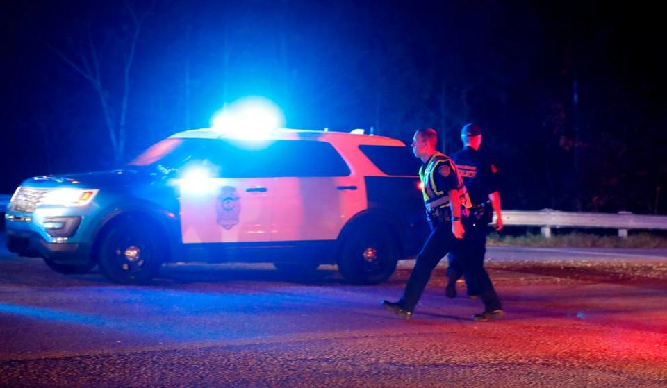 Police block the entrance to I-540 east at Buffaloe Road in Raleigh, N.C., Thursday, Oct 13, 2022.