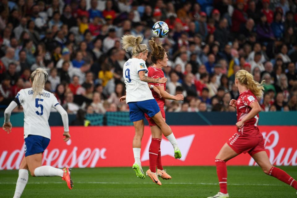 Denmark's midfielder #19 Janni Thomsen (C-R) and England's forward #09 Rachel Daly (C-L) fight for the ball during the Australia and New Zealand 2023 Women's World Cup Group D football match between England and Denmark at Sydney Football Stadium in Sydney on July 28, 2023.