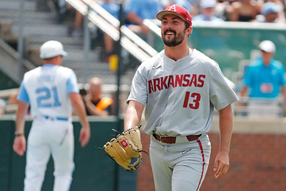 Arkansas's Connor Noland (13) reacts following a ground out by North Carolina's Mikey Madej, not pictured, during the first inning of an NCAA college super regional baseball game in Chapel Hill, N.C., Saturday, June 11, 2022. (AP Photo/Karl B DeBlaker)