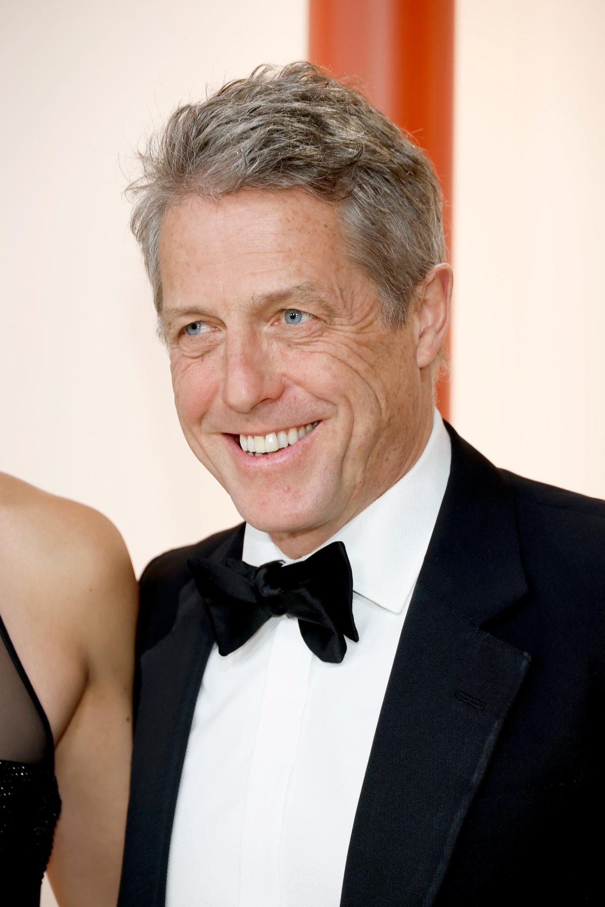Hugh Grant criticized for ‘rude’ 2023 Oscars interview with Ashley Graham: Watch