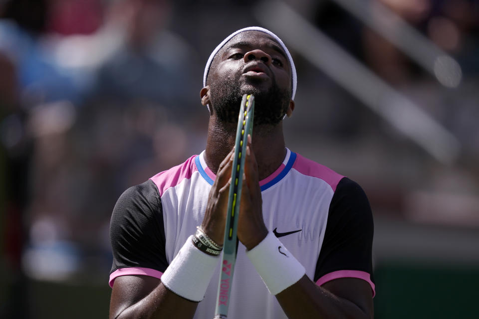 Frances Tiafoe, of the United States, reacts after losing a point against Stefanos Tsitsipas, of Greece, at the BNP Paribas Open tennis tournament in Indian Wells, Calif., Sunday, March 10, 2024. (AP Photo/Ryan Sun)