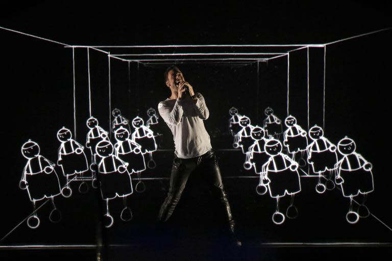 Sweden's Mans Zelmerlow performs after winning the 60th Eurovision Song Contest final on May 23, 2015 in Vienna