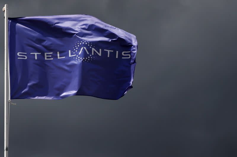 FILE PHOTO: A flag with the logo of Stellantis is seen near Paris