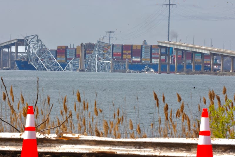 The cargo ship Dali is shown after running into and collapsing the Francis Scott Key Bridge on March 26, 2024 in Baltimore, Maryland. According to reports, rescuers are still searching for multiple people, while two survivors have been pulled from the Patapsco River. A work crew was fixing potholes on the bridge, which is used by roughly 30,000 people each day, when the ship struck at around 1:30am on Tuesday morning. The accident has temporarily closed the Port of Baltimore, one of the largest and busiest on the East Coast of the U.S. - Photo: Kena Betancur (Getty Images)