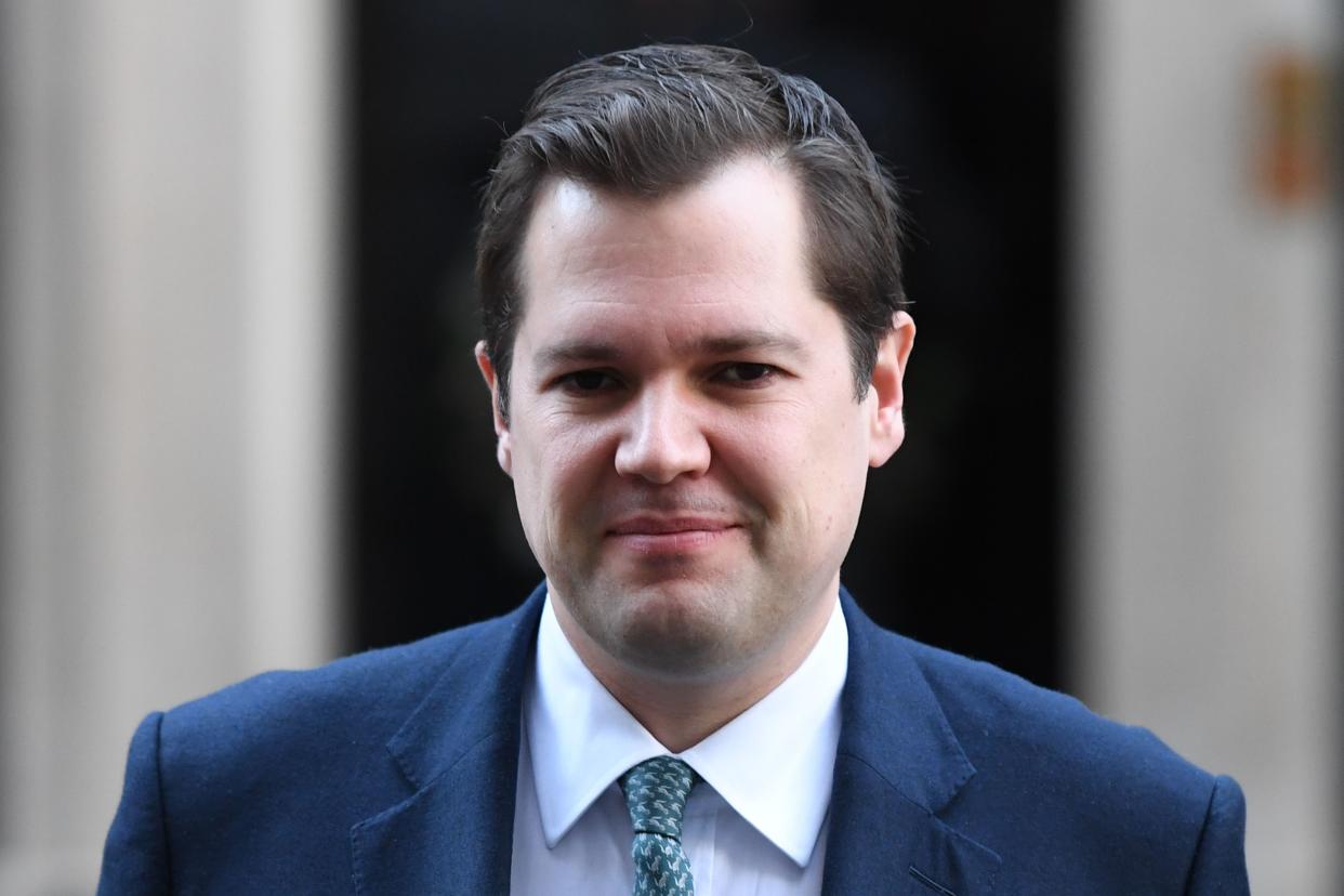 Britain's Housing, Communities and Local Government Secretary Robert Jenrick walks through Downing Street in London on December 1, 2020 to attend the weekly cabinet meeting held at the nearby Foreign, Commonwealth and Development Office. - UK lawmakers were set to vote on a new toughened system of tiered coronavirus restrictions on December 1 with a sizable rebellion of governing Conservative party members expected. (Photo by DANIEL LEAL-OLIVAS / AFP) (Photo by DANIEL LEAL-OLIVAS/AFP via Getty Images)