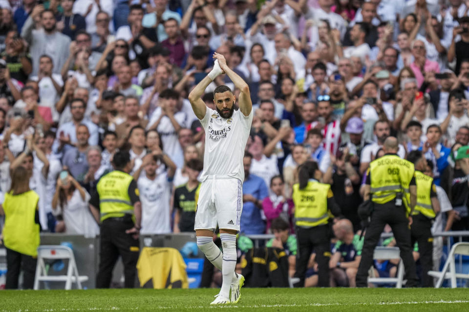 Real Madrid's Karim Benzema claps to supporters during the Spanish La Liga soccer match against Athletic Bilbao at the Santiago Bernabeu stadium in Madrid, Sunday, June 4, 2023. (AP Photo/Bernat Armangue)