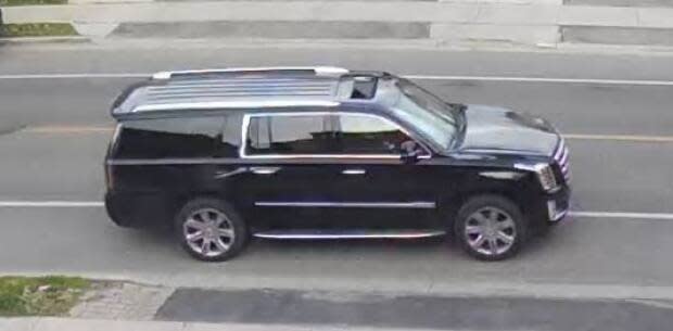 Police say two suspects wanted in connection with a Brampton shooting fled the area in this Cadillac Escalade.