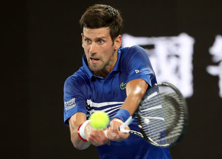 Tennis - Australian Open - First Round - Melbourne Park, Melbourne, Australia, January 15, 2019. Serbia’s Novak Djokovic in action during the match against Mitchell Krueger of the U.S. REUTERS/Lucy Nicholson