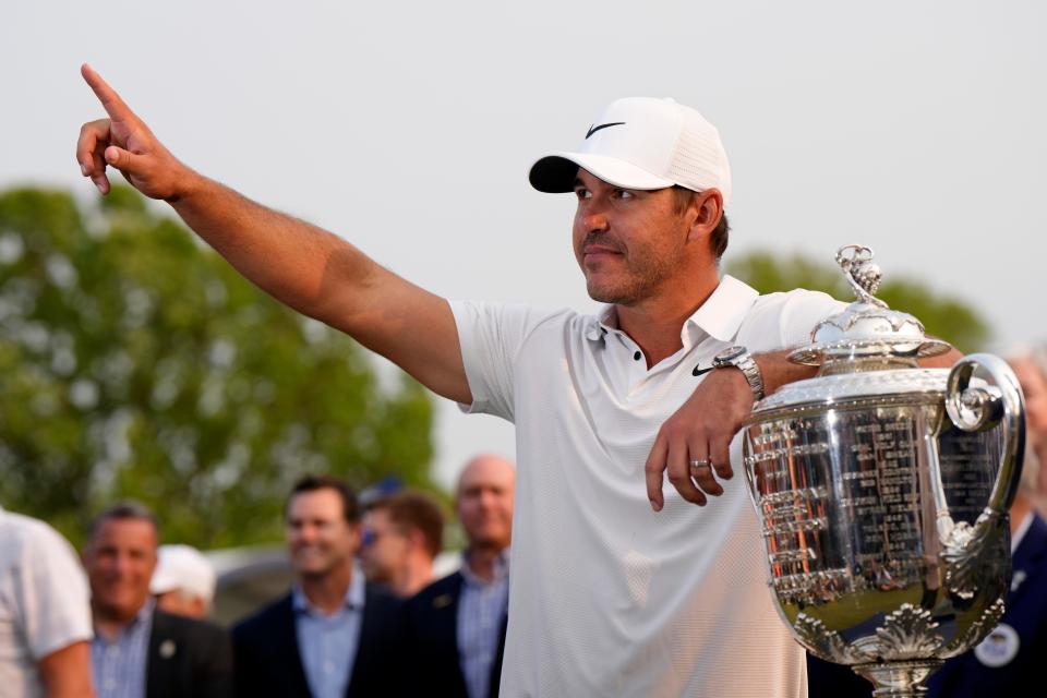 May 21, 2023;  Rochester, New York, USA;  Brooks Koepka celebrates after winning the PGA Championship golf tournament at Oak Hill Country Club.  Mandatory Credit: Adam Cairns-USA TODAY Sports