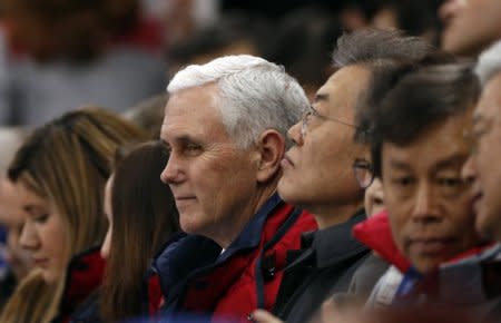 U.S. Vice President Mike Pence and South Korea's President Moon Jae-in attend short track speed skating events at the Gangneung Ice Arena in South Korea, February 10, 2018. REUTERS/John Sibley