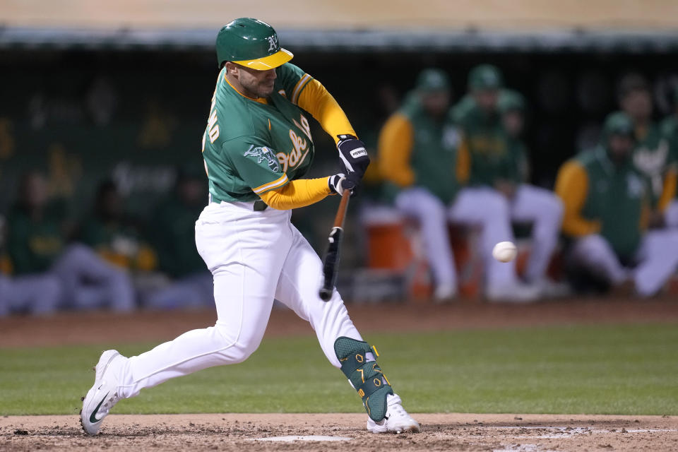 Oakland Athletics' Ramon Laureano hits a two-run home run during the fifth inning of a baseball game against the Cleveland Guardians in Oakland, Calif., Monday, April 3, 2023. (AP Photo/Jeff Chiu)