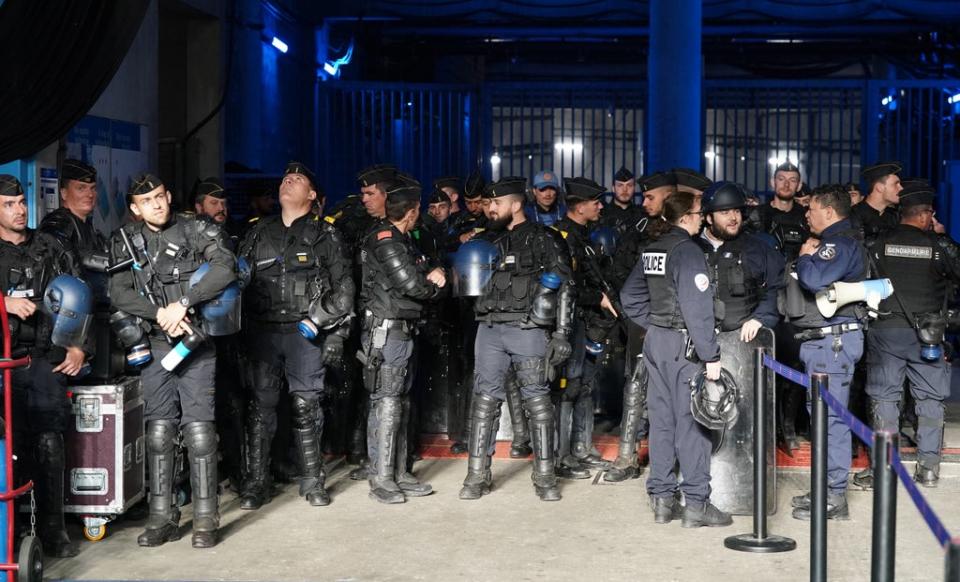 Police wait in one of the tunnels at the stadium (Nick Potts/PA) (PA Wire)