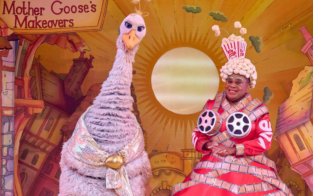 Clive Rowe (as Mother Goose) with Ruth Lynch (as Priscilla the Goose) in Mother Goose, at the Hackney Empire - Manuel Harlan