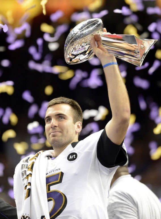 Joe Flacco of the Baltimore Ravens holds up the Vince Lombardi Trophy following his team's 34-31 victory over the Baltimore Ravens in Super Bowl XLVII on February 3, 2013 in New Orleans, Louisiana