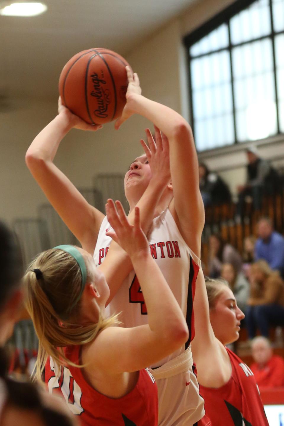 Port Clinton's Olivia Spencer looks to score.