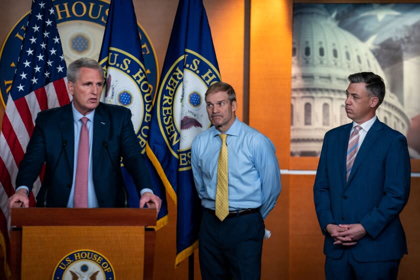 WASHINGTON, DC - JULY 21: House Minority Leader Kevin McCarthy (R-CA), flanked by fellow Republican House members speaks during a news conference on House Speaker Nancy Pelosi's decision to reject two of Leader McCarthy's selected members (Rep. Banks and Rep. Jordan) from serving on the committee investigating the January 6th insurrection, on Capitol Hill on Wednesday, July 21, 2021. McCarthy was joined by (L to R) Rep. Troy Nehls (R-TX), Rep. Kelly Armstrong (R-ND), Rep. Jim Banks (R-IN), Rep. Jim Jordan (R-OH) and Rep. Rodney Davis (R-IL). (Kent Nishimura / Los Angeles Times)
