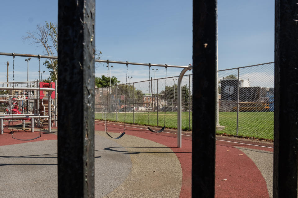 An empty playground with swings in Philadelphia. (Stephanie Mei-Ling for NBC News and ProPublica)