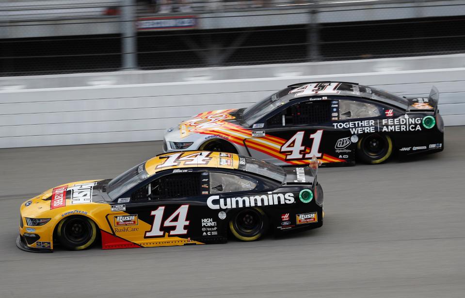 Mitchell's Chase Briscoe in the Cummins Engines 14   duels with Stewart-Haas Racing teammate Cole Custer at Michigan International Speedway.