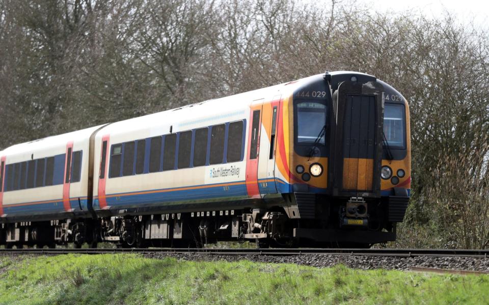 Trains were running to schedule only 62.2 per cent of the time last year, not 86.9 per cent as previously reported - PA