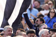 Newcastle United chairman Yasir Al-Rumayyan gestures, during the English Premier League soccer match between Newcastle United and Brighton & Hove Albion, at St. James' Park, in Newcastle, England, Saturday May 11, 2024. (Owen Humphreys/PA via AP)