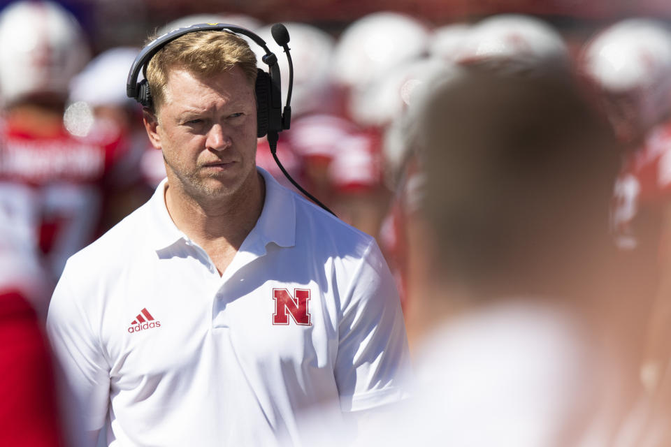 Nebraska head coach Scott Frost walks amongst his players on the sideline in the second hlaf against North Dakota at Memorial Stadium on Saturday, Sept. 3, 2022, in Lincoln, Neb. (Kenneth Ferriera/Lincoln Journal Star via AP)