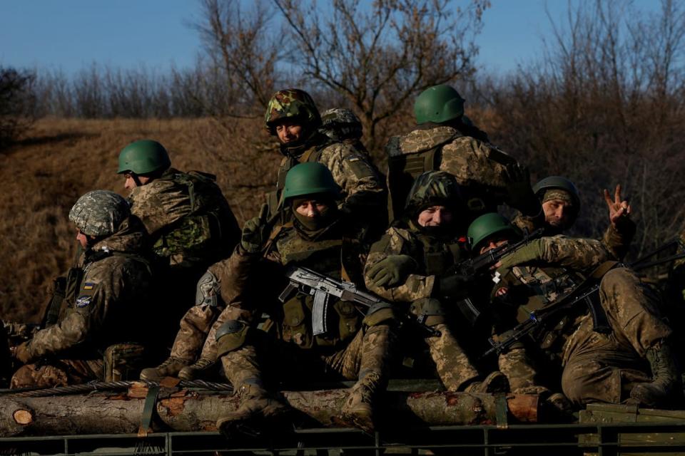 <div class="inline-image__caption"><p>Soldiers from Carpathian Sich international battalion gesture while conducting manoeuvres near the front line, as Russia's attack on Ukraine continues, near Kreminna, Ukraine, January 3, 2023.</p></div> <div class="inline-image__credit">Clodagh Kilcoyne via Reuters</div>