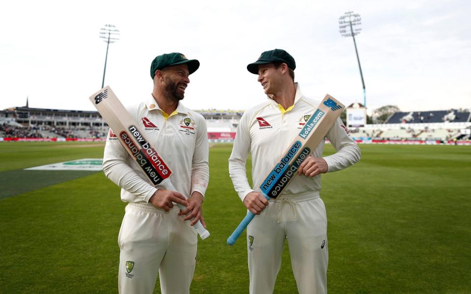 Matthew Wade and Steve Smith of Australia pose at stumps after both scoring centuries during day four against England - Getty Images Europe