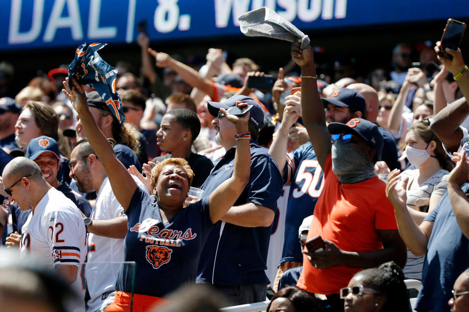 Aug 14, 2021; Chicago, Illinois, USA; Fans cheer while watching the game between the Chicago Bears and the Miami Dolphins during the first half at Soldier Field. Mandatory Credit: Jon Durr-USA TODAY Sports