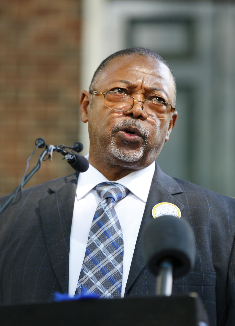 NAACP Virginia President Robert N. Barnette, Jr., speaks about a Freedom of Information Act related to the changes the Youngkin administration made to restoring rights to formerly incarcerated people near the Virginia State Capitol in Richmond, Va., on Tuesday, July 18, 2023. (Daniel Sangjib Min/Richmond Times-Dispatch via AP)