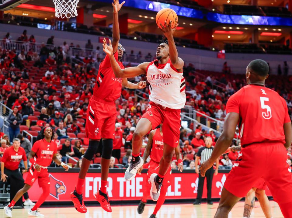 Louisville's Emmanuel Okorafor is being called on to set the tone physically in the paint this season.