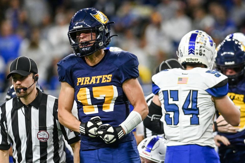 Pewamo-Westphalia's Troy Wertman celebrates after the Pirates recover a Lawton fumble during the first quarter on Saturday, Nov. 27, 2021, at Ford Field in Detroit.