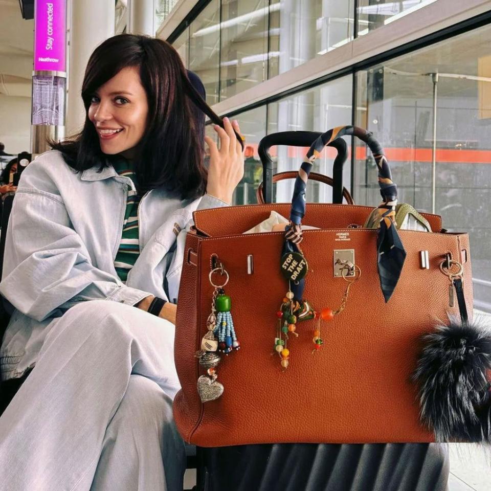 Lily Allen’s maximalist handbag is decorated with adorable charms. Lily Allen/Instagram