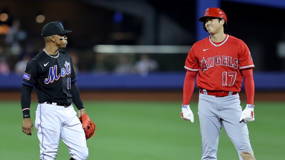Los Angeles Angels designated hitter Shohei Ohtani (17) talks to New York Mets shortstop Francisco Lindor (12) at second base during the fifth inning at Citi Field