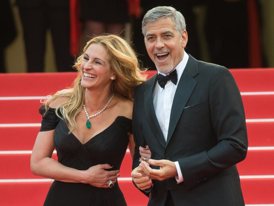 Julia Roberts and George Clooney laugh at the Cannes Film Festival