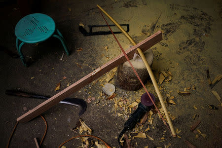 A newly made crossbow is seen at a workshop in Liuku township of Nujiang Lisu Autonomous Prefecture in Yunnan province, China, March 27, 2018. REUTERS/Aly Song