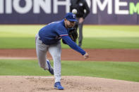 Texas Rangers starting pitcher Dane Dunning delivers during the first inning of a baseball game against the Cleveland Guardians in Cleveland Saturday, Sept. 16, 2023. (AP Photo/Phil Long)